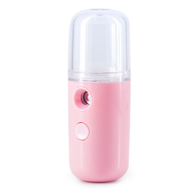 The Piw Wee 30ml Mini Face Spray is a small, pink, travel-friendly facial mist with a clear cap and two buttons on the front, specifically designed to deliver deep moisture on the go.